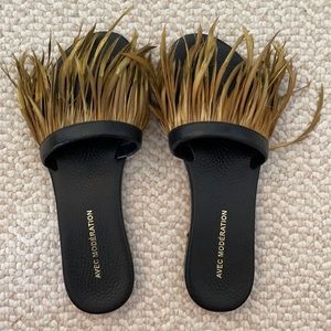 Feathered gold sandals